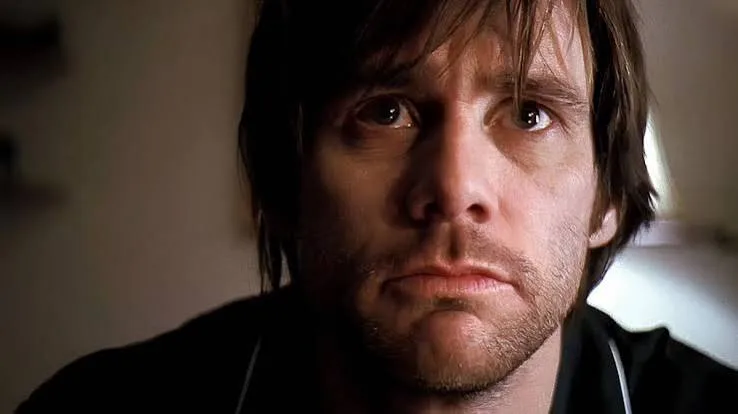 Jim Carrey as Joel Barish in Eternal Sunshine of the Spotless Mind, looking flat and withdrawn